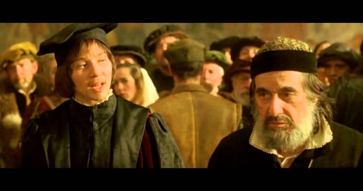Al Pacino as Shylock with white beard and black hat in The Merchant of Venice (2004)
