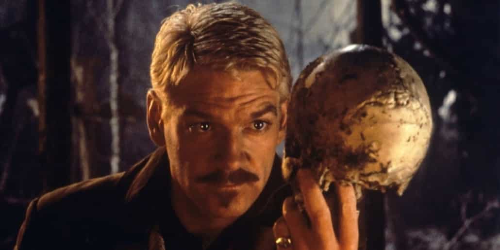 Kenneth Brannagh looks at skull as he speaks 'Alas poor Yorick'